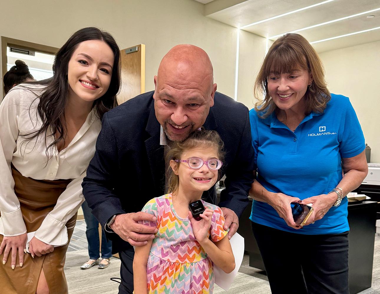 make a wish Holmans employees with Make a Wish foundation